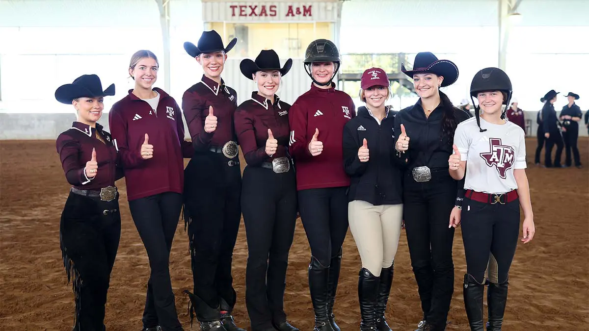 Women giving thumbs up