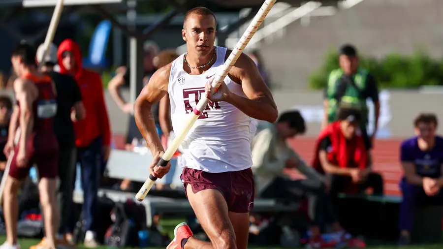 pole vaulter running with pole
